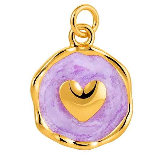 A gold-plated pendant charm featuring a round, irregularly shaped purple marbled face with a polished gold heart in the center and a top hanging loop, shown on a clean white background.