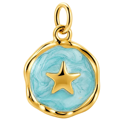A gold charm pendant featuring a wavy circular bezel with a light blue marbled resin background and a central gold star, shown on a clean white background.
