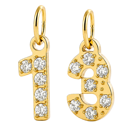 A pair of gold numerals '1' and '3' charms, each adorned with clear round-cut gemstones, shown on a clean white background.