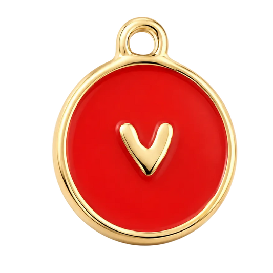 A round gold-tone charm with a vibrant red enamel face and a small raised gold heart in the center, shown on a clean white background.