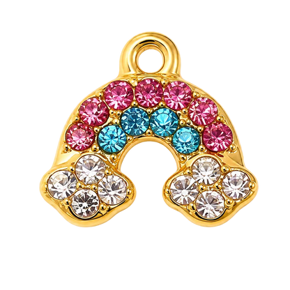Gold rainbow charm with pink, blue, and clear rhinestones on a white and gray checkered background.